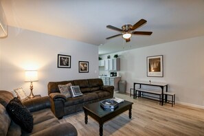 Very spacious living room and cozy sofa for your family :)