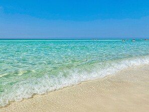 Inlet Beach is known for the white sand beaches stretching for miles, crystal clear turquoise waters for swimming and snorkeling, and the stunning natural beauty of the sand dunes.