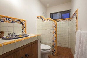 Each of the 3 full bathrooms is adorned with beautiful handmade tiles and talavera.