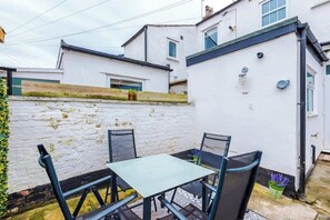 The spacious patio area to the rear of the property is perfect for evening drinks with friends before venturing into Chester. Equipped with outdoor furniture, it makes a great place for a coffee and chat.