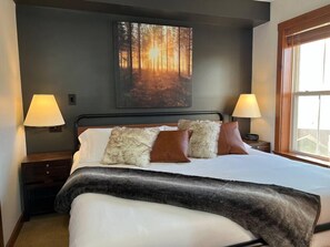 Inviting king bed is the perfect spot to relax and unwind, watch the smart TV before you doze off. 