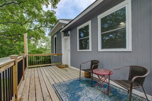Back Patio with seating and propane grill.