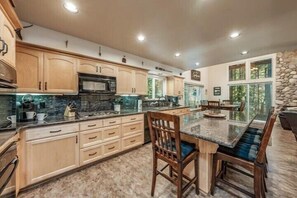 The kitchen is open to the dining and living room area.