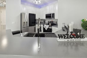 "Indoors","Kitchen","Microwave","Oven","Floor"