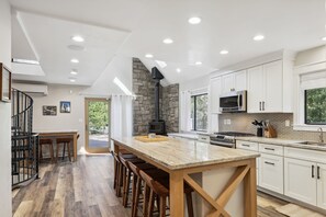 Dining Area/Kitchen | 2nd Floor | Island w/ Seating | Wood-Burning Stove