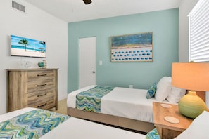 Second bedroom has 2 twin beds and Roku TV