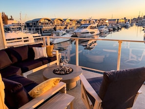 A beautiful spot to be in any season, overlooking all the boats in the marina the downtown Vancouver skyline behind it. Dusk is magic as the city lights turn on for the night.