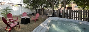 Our property is a true escape with a hot tub, firepit, outdoor seating, and a BBQ grill – the ultimate recipe for a perfect getaway!