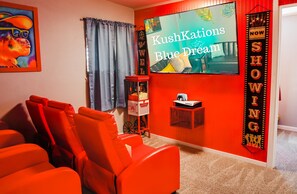 Movie Magic Awaits! – Step into our theater room and experience the ultimate cinematic adventure. Don't forget to grab some freshly popped popcorn from our popcorn maker!