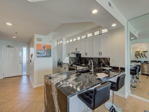 Beautifully updated kitchen with stainless steel appliances.