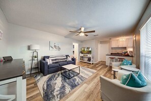 Relax in this peaceful open concept living space with flat screen TV.