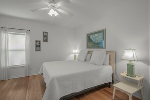 Main bedroom with king-size bed.