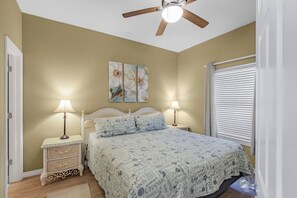 Main bedroom with king-size bed.