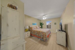 Main bedroom with king-size bed.