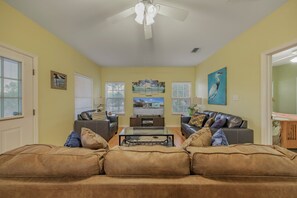 Living area with large flat screen TV