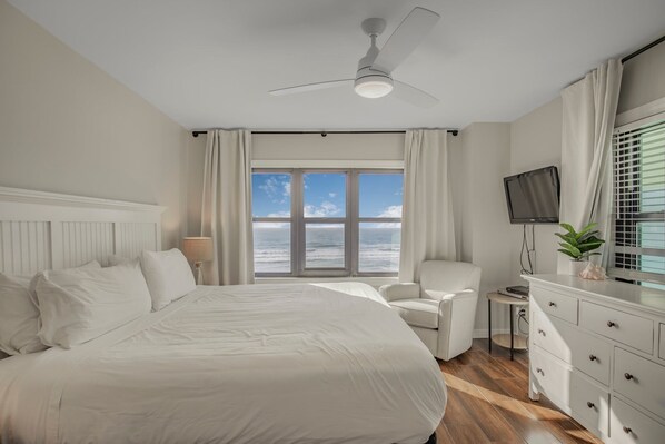 Peaceful main bedroom featuring a king-size bed