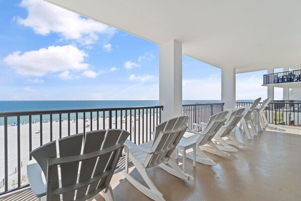 Large wrap around private balcony overlooking white sugar sands!
