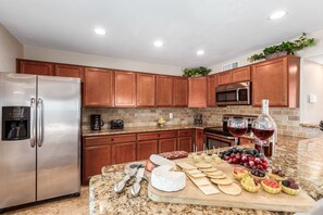 Fully equipped kitchen with stainless steel appliances, and all your basic cooking essentials.