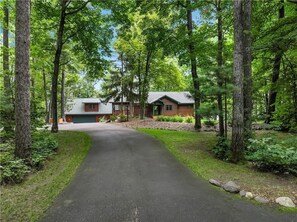 Paved driveway with privacy and plenty of parking to accommodate your group.