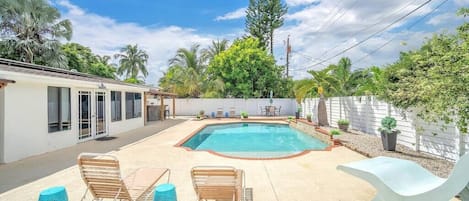 Savor the Fort Lauderdale sunshine as you unwind in this charming private pool, safely enclosed by a fence to protect your privacy.