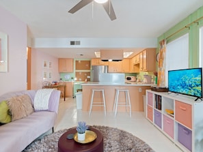 Kick back on the sofa, catch up on your favorite shows on the smart TV, or simply enjoy the company of friends and family in this inviting space.