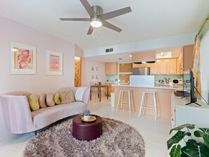 Kick back on the sofa, catch up on your favorite shows on the smart TV, or simply enjoy the company of friends and family in this inviting space.