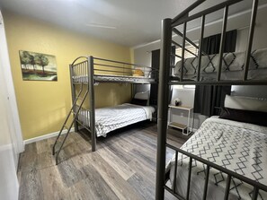 Two bunk bed twin over twin, blackout curtains, closets