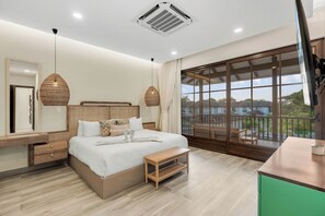 Main bedroom, King bed, private bathroom, balcony access 