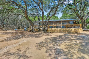 The Bulverde Cottage is nestled between local hill country landscape