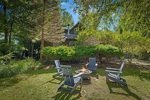 Memories are made around fire pits, and wood for this one is conveniently supplied on property for guest use.