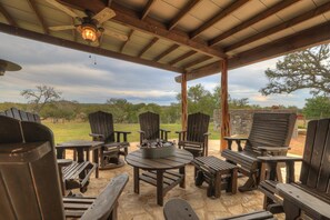 Gather around in the shaded patio of the Saloon.