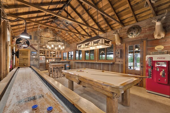 Pool table and shuffle board await.