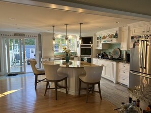 Eat in kitchen; glass sliding doors to deck.