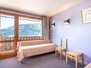 Sink into the cozy sofa after a day exploring the area.