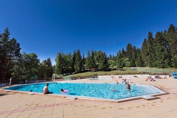 Cool off in the shared municipal pool.