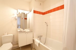 Freshen up in your lovely bathroom. 