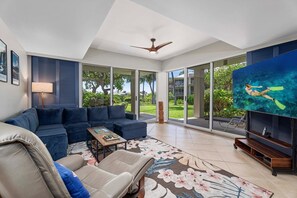 This immaculate unit is bathed in natural light, showcasing a vibrant decor palette, and promises a pristine and comfortable stay for your Hawaiian getaway.
