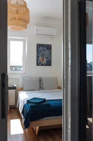 Bright bedroom equipped with AC
