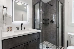 Wash the day off under this incredible rain shower!