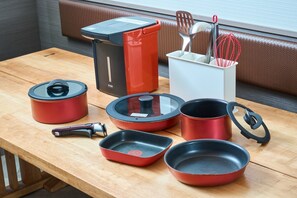 Cooking utensils are also available in the room.