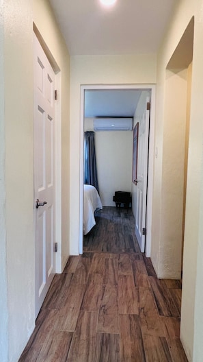Hallway leading to bedrooms: view of the guest bedroom