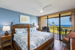 The master bedroom features a king bed and has access to the lanai. Split AC systems in both bedrooms.