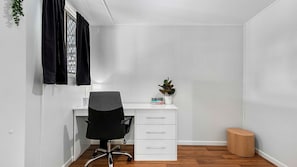 a tailored corner designed for productivity and focus. With a comfortable desk, ergonomic chair, and thoughtful organization, this workspace is your haven for accomplishing tasks and fostering creativity. 