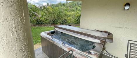 Soak away your stress in this private three-person hot tub.