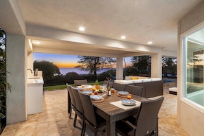 Dine with panoramic twilight views at the lanai