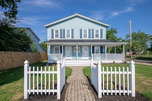 Beautiful century home with wraparound porch awaits your family!