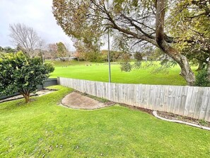 Back yard just off the rear deck with elevated and ground level views across park
