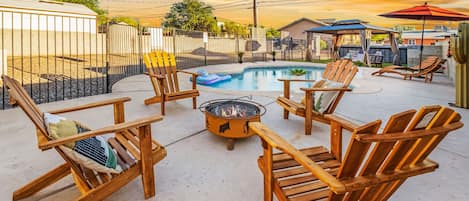 Patio Fire Pit Lounging beside pool area