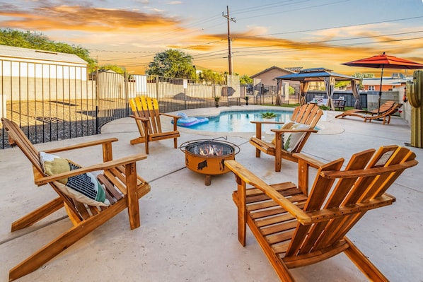 Patio Fire Pit Lounging beside pool area