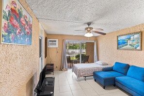 One complete condominium with all the furnishings and comforts. Your balcony overlooks the eighth-foot pool just a few feet from your doorstep. There are restaurants that specialize in local, Latin, and Caribbean food within walking distance—plenty of free onsite parking.
